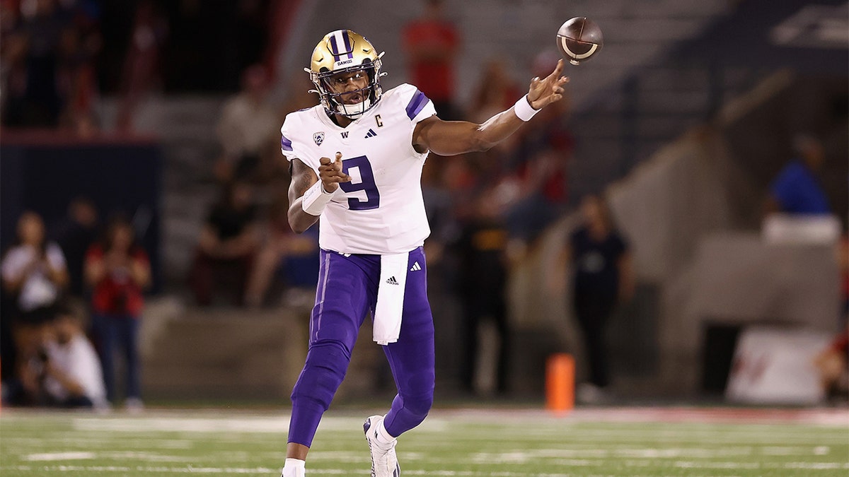 Michael Penix Jr. throws against Arizona