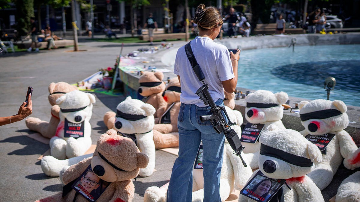 Teddy bears blindfolded to raise awareness of young hostages