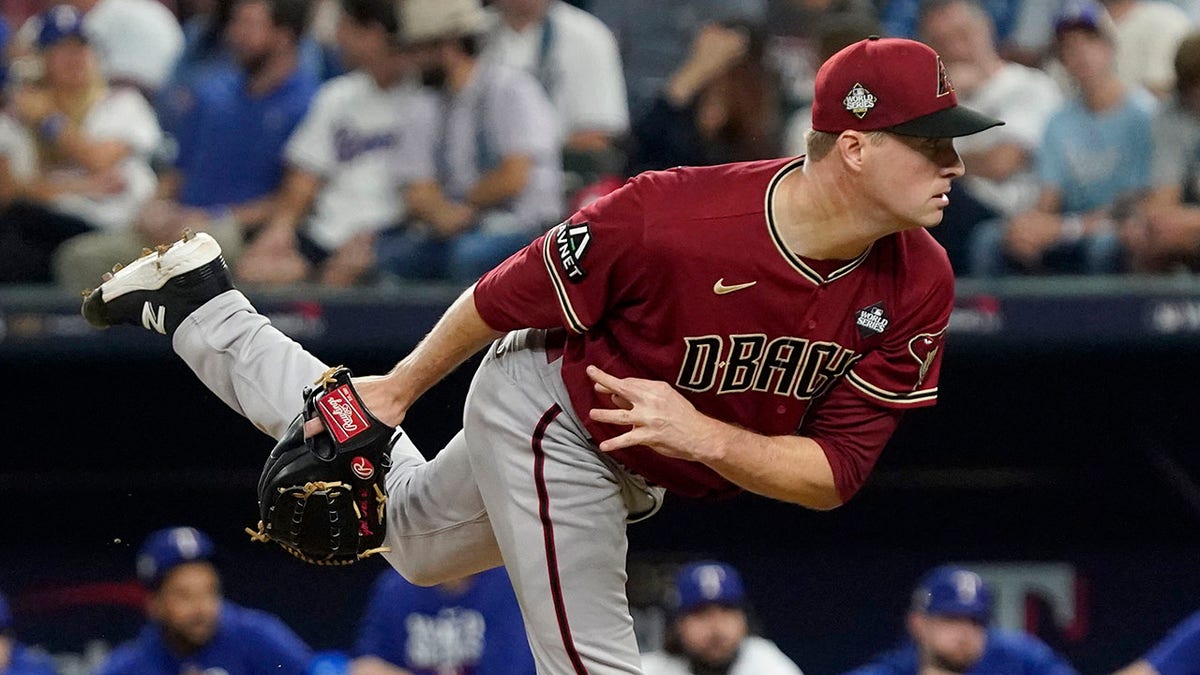 Joe Mantiply throws a pitch during a Diamondbacks game