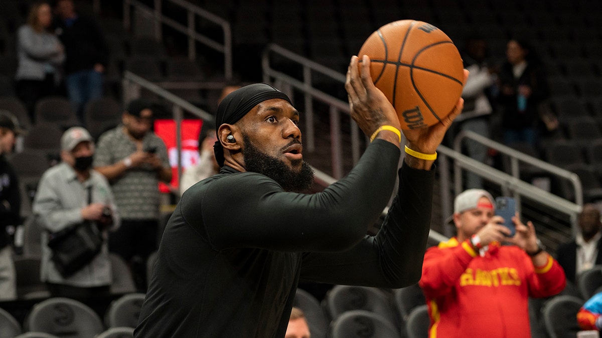 LeBron James warms up