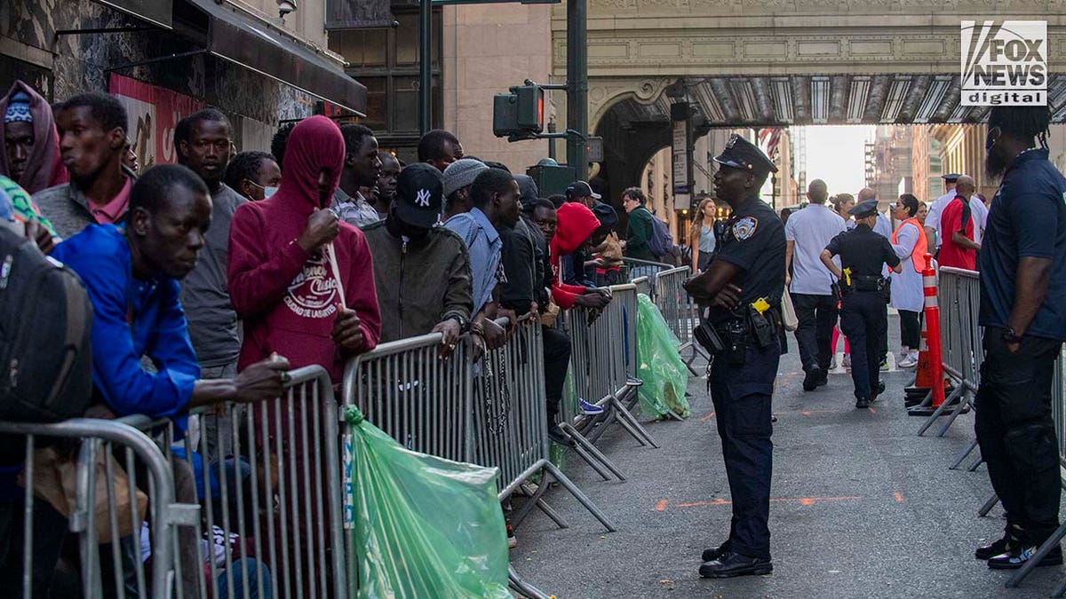 Migrants outside Roosevelt Hotel