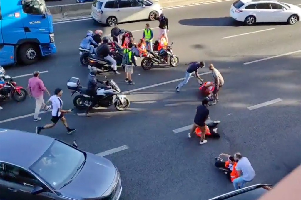 According to the Portugal Resident, activists from a group called Climáximo, sat on Lisbon’s Segunda Circular highway to protest the nearby energy company Galp