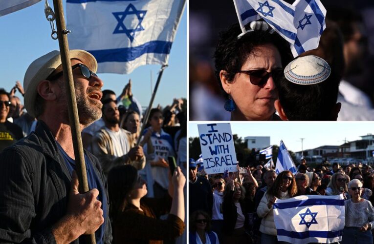 Australia’s Jewish community gather for vigil following Hamas attacks