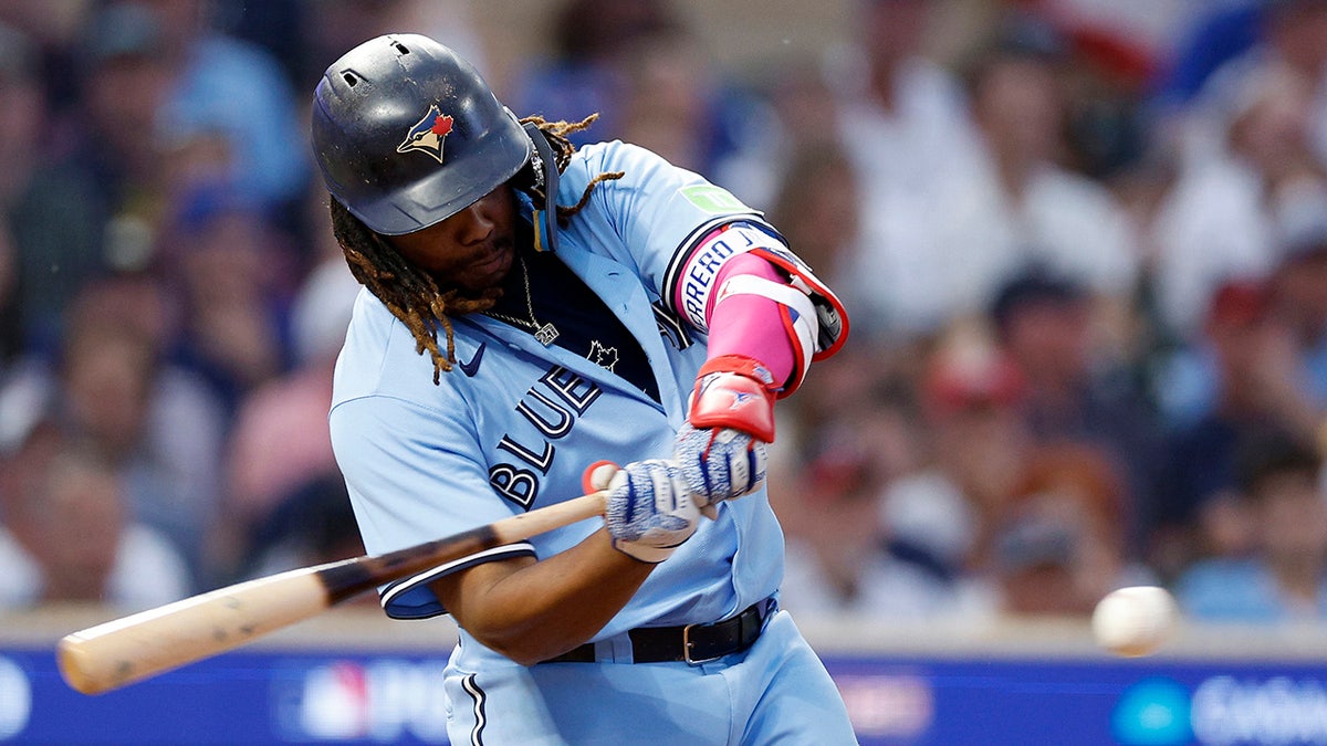 Vladimir Guerrero Jr. swings bat