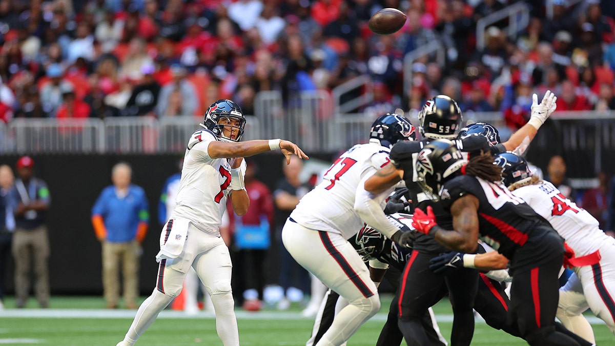 C.J. Stroud throws a pass