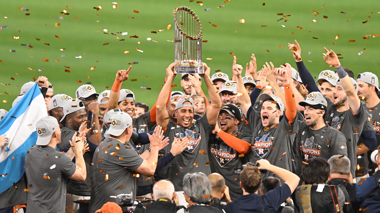 Houston Astros holding Commissioner's Trophy