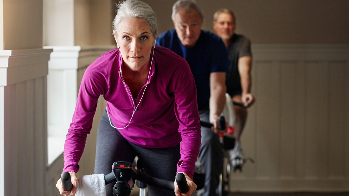 older woman biking