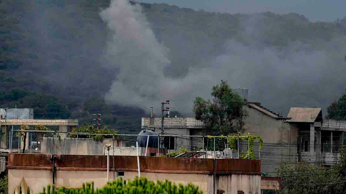 smoke rising from fighting