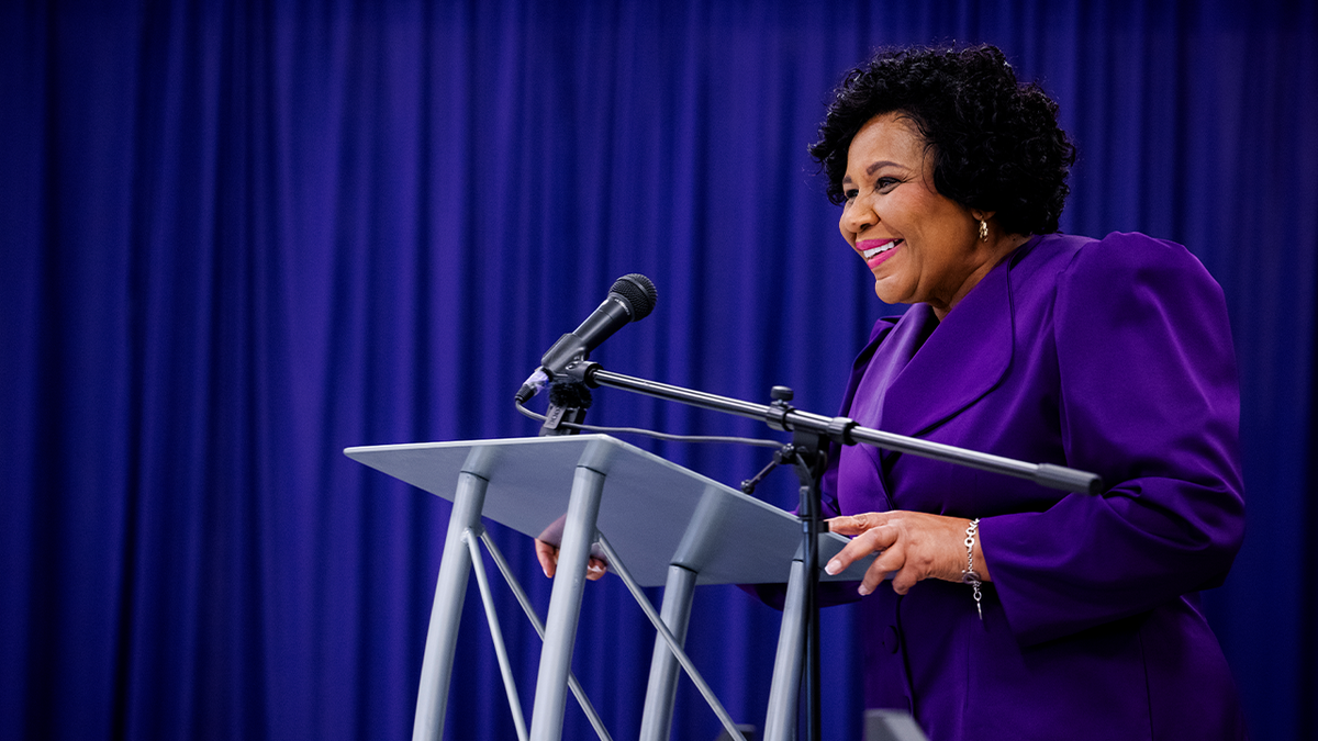 Alice Marie Johnson at lectern speaking