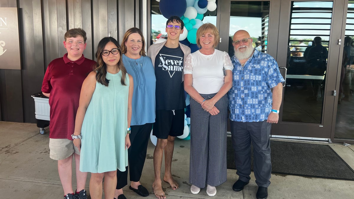 Gabriel with nursing staff at baptism