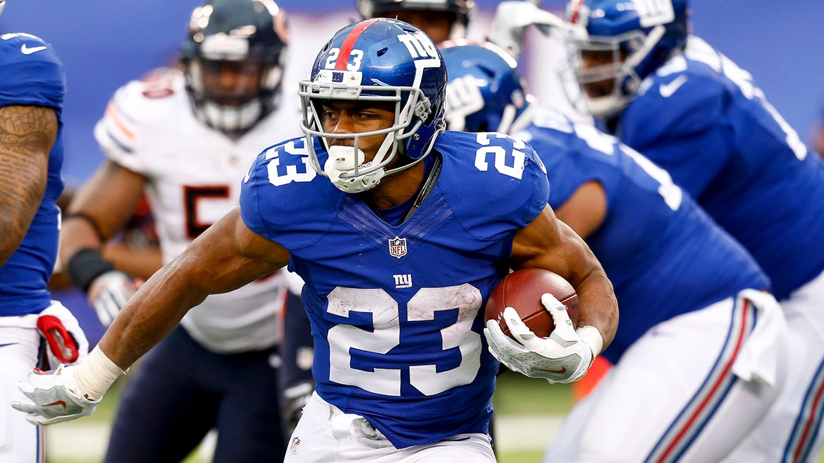 Rashad Jennings rushes the ball