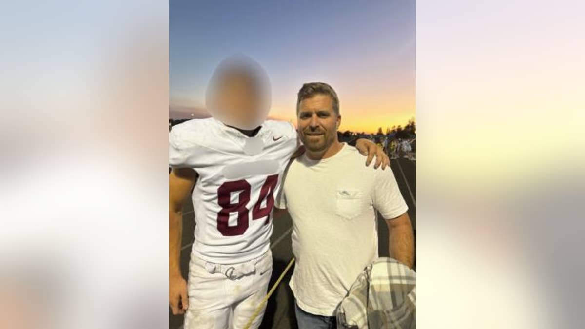 Ryan Martin fatal shooting victim poses with blurred family member or friend