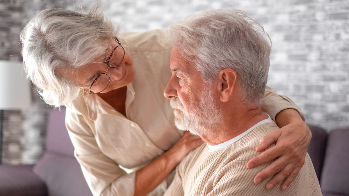 Elderly man with wife