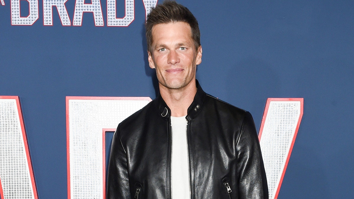 Tom Brady poses on red carpet