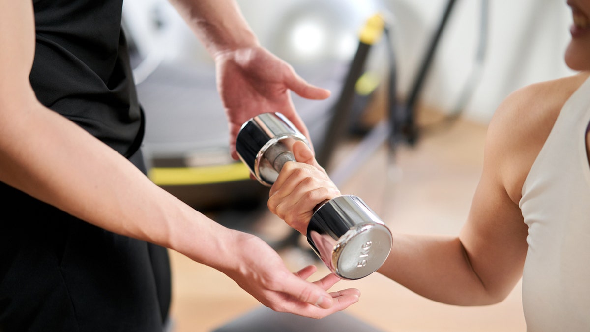 Woman lifting weight