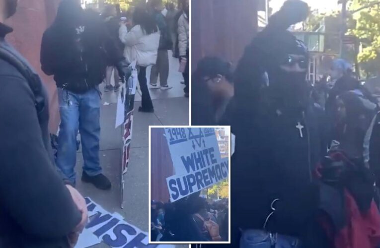 Masked man spits on Jewish sign at NYU protest