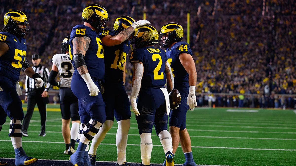 Michigan celebrates a touchdown