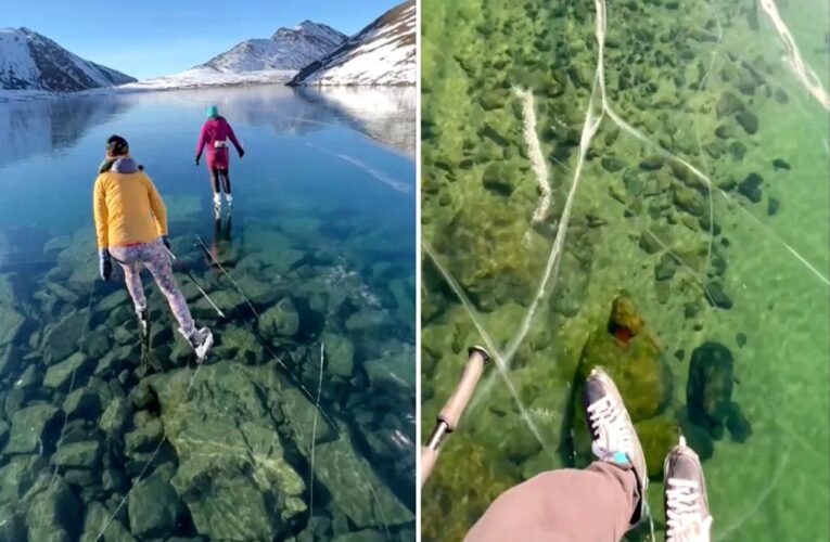 Alaskan couple skate on clear ‘ice window’ that formed over lake