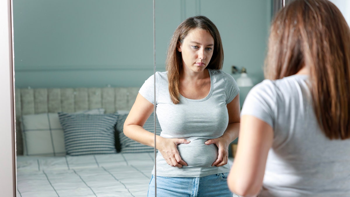 Woman with belly fat