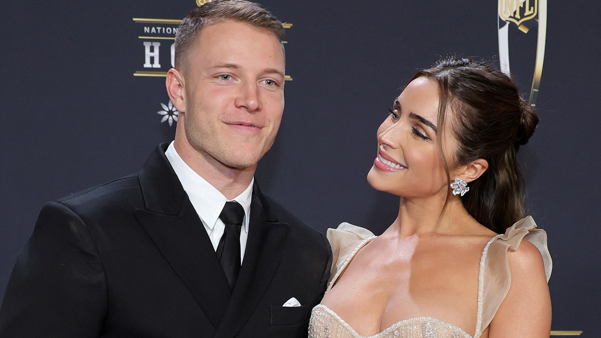 Christian McCaffrey and Olivia Culpo