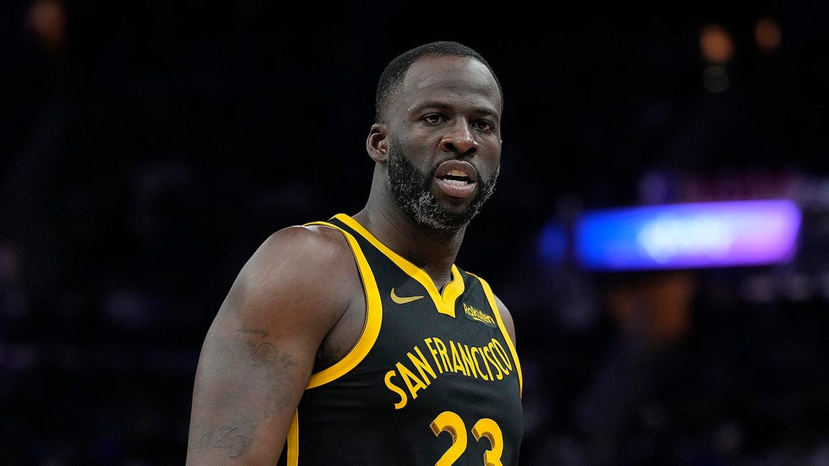 Draymond Green looks on court