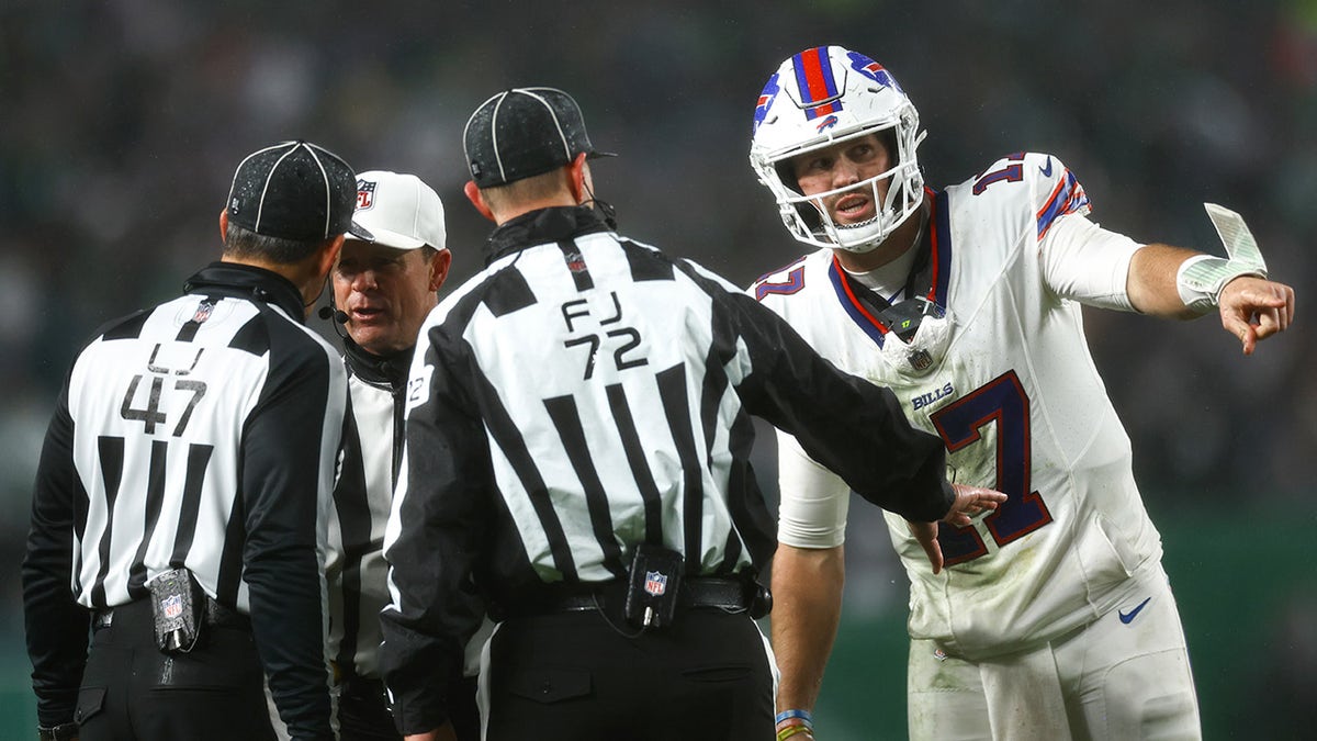 Josh Allen talks to officials