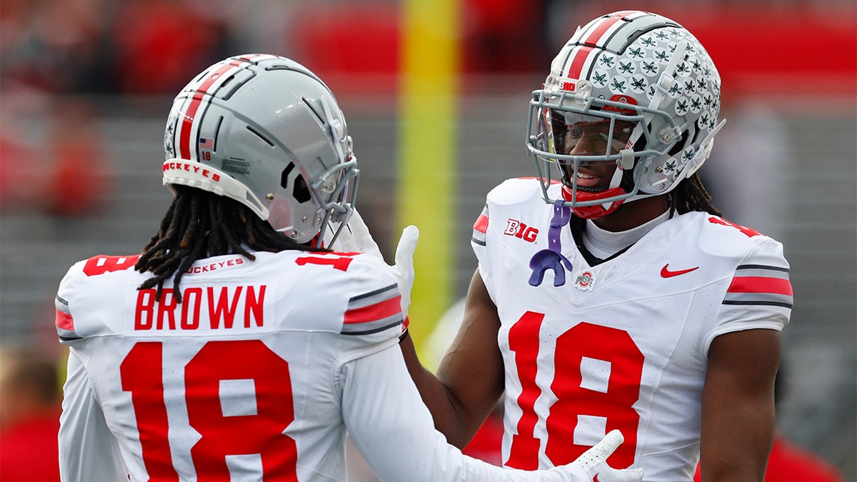 Marvin Harrison Jr. with his teammate against Purdue