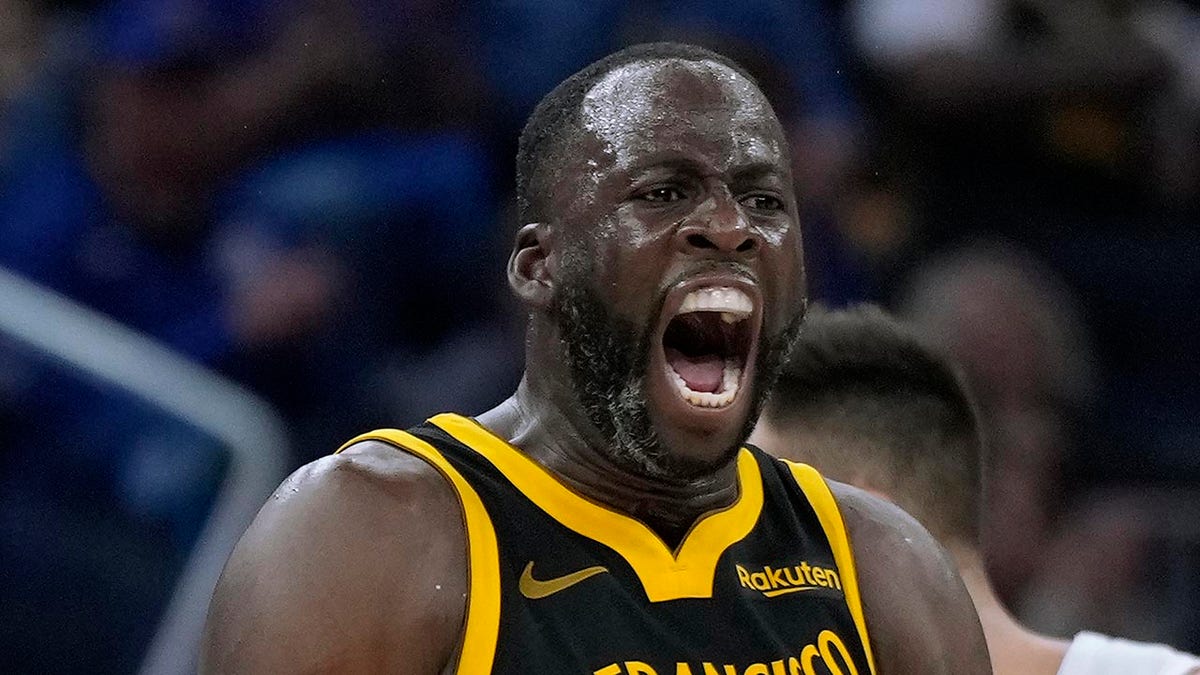 Draymond Green yells on court