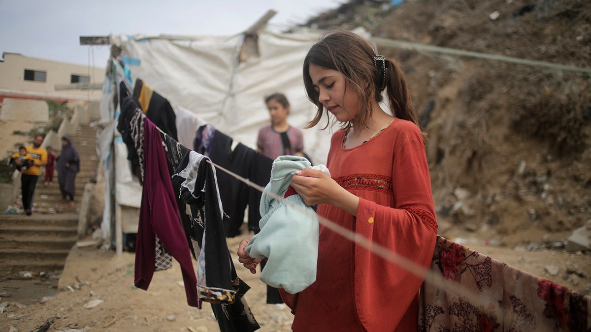 A girl holding water