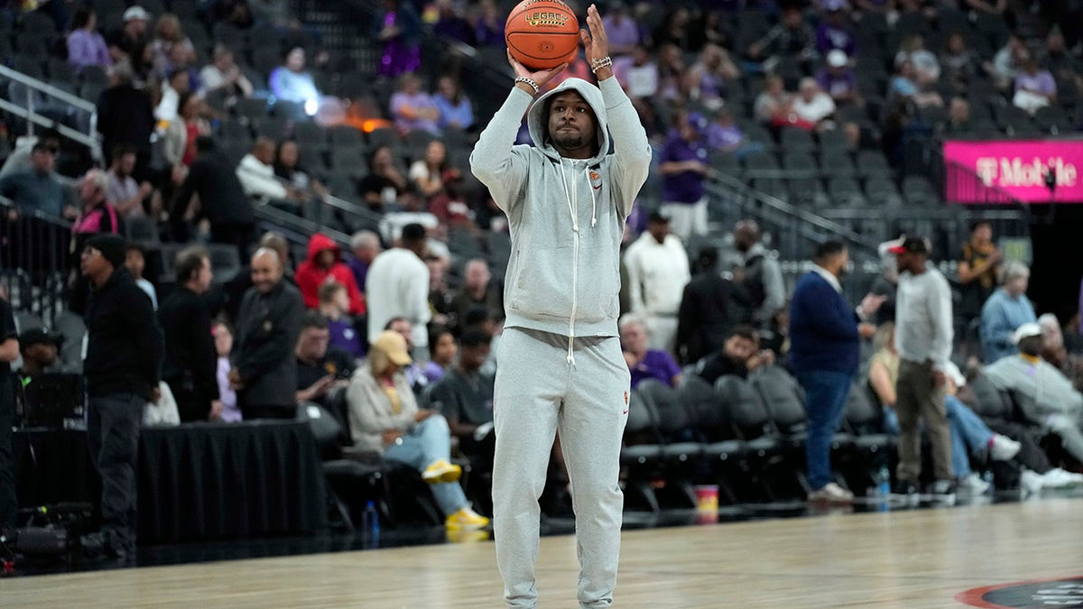 Bronny James warms up