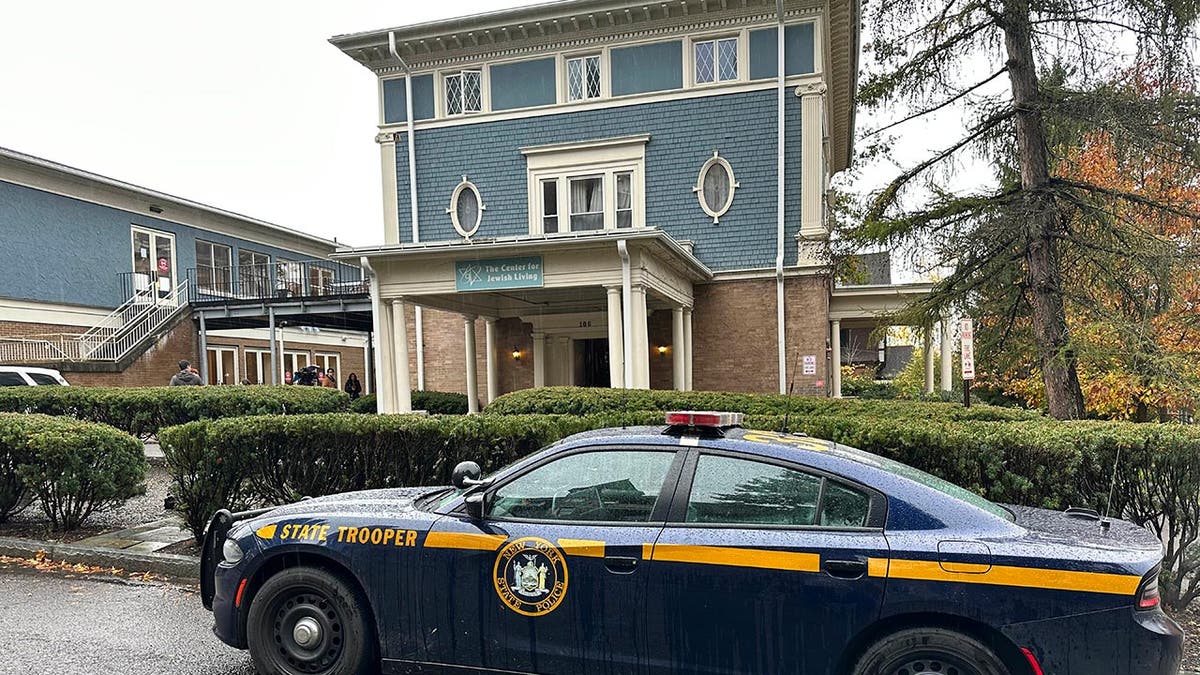 Police car out the front of a Jewish dining hall at Cornell