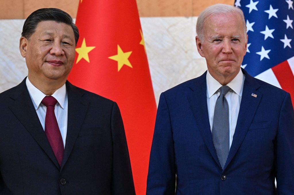 President Joe Biden (R) and China's President Xi Jinping (L) meet on the sidelines of the G20 Summit in Nusa Dua on the Indonesian resort island of Bali on Nov. 14, 2022. 