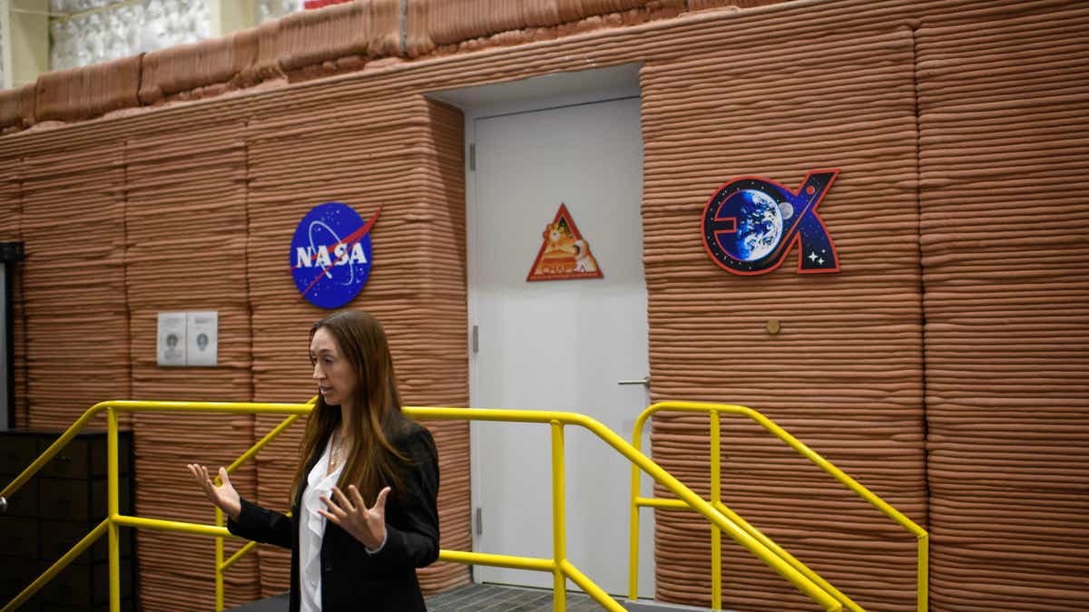 Exteriror of the Mars Dune Alpha dwelling. It is made from burnt orange colored concrete