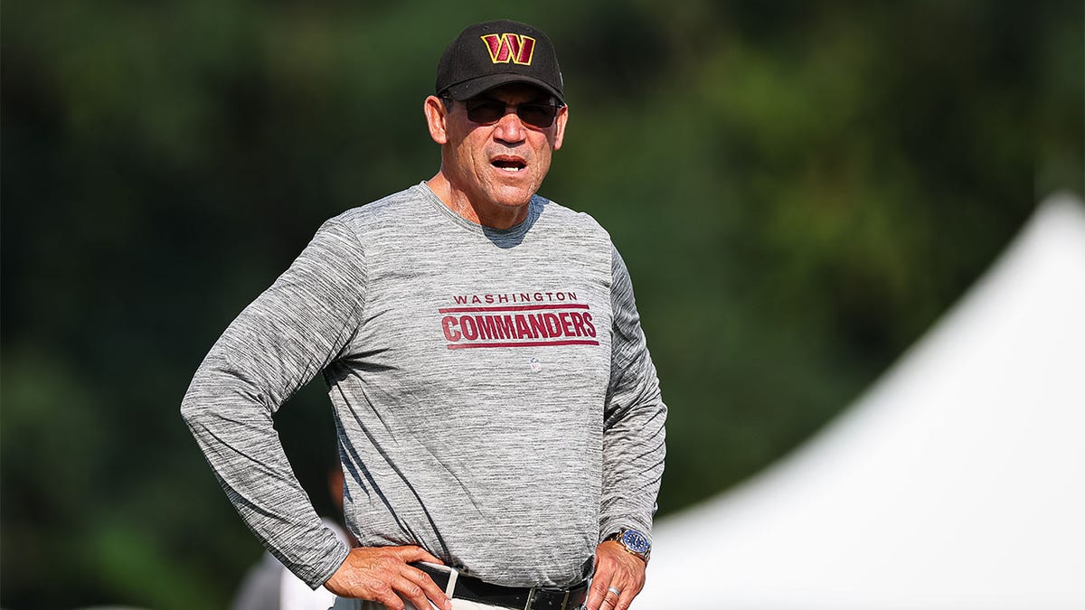 Ron Rivera looks on at training camp