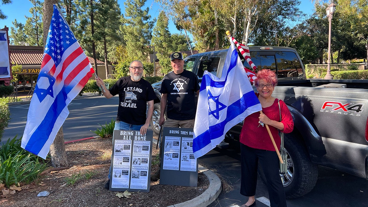 Demonstrators at pro-Israel rally at site where Paul Kessler died