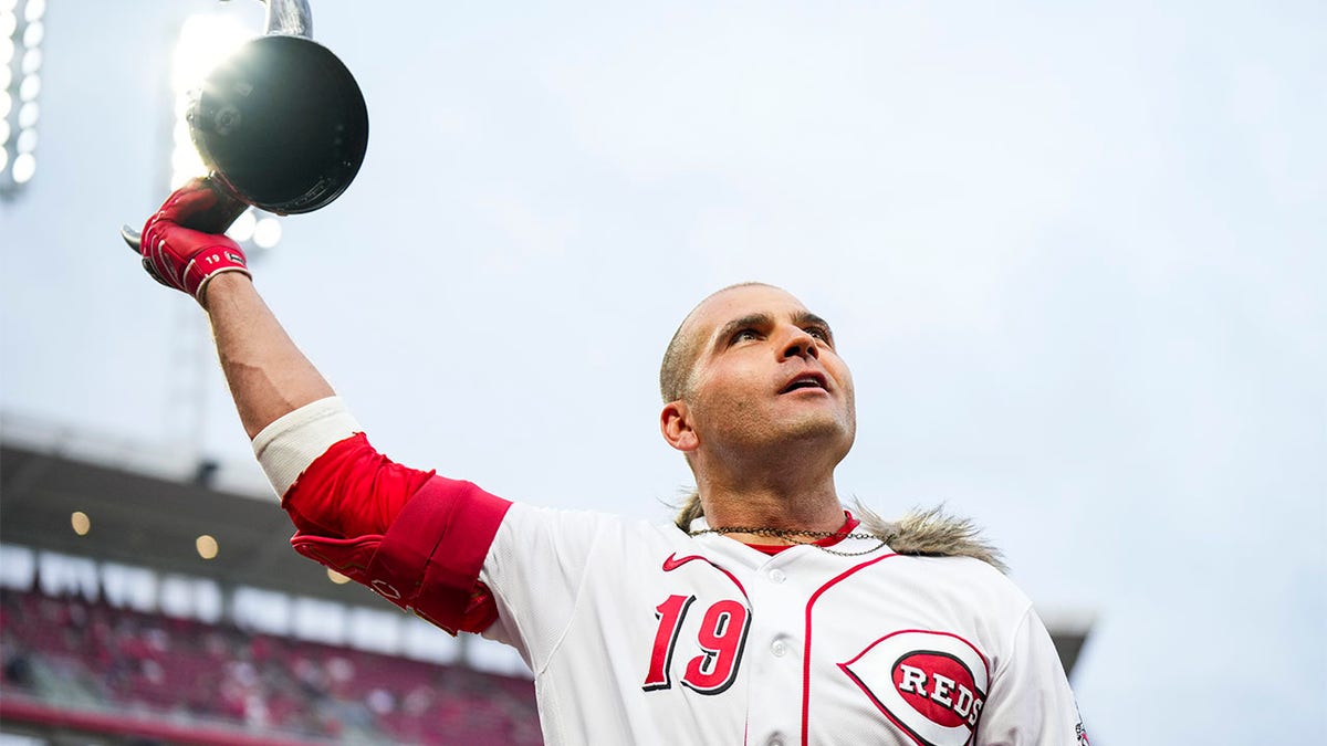 Joey Votto waves to fans