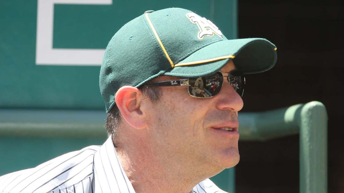 Oakland Athletics owner John Fisher watches a game