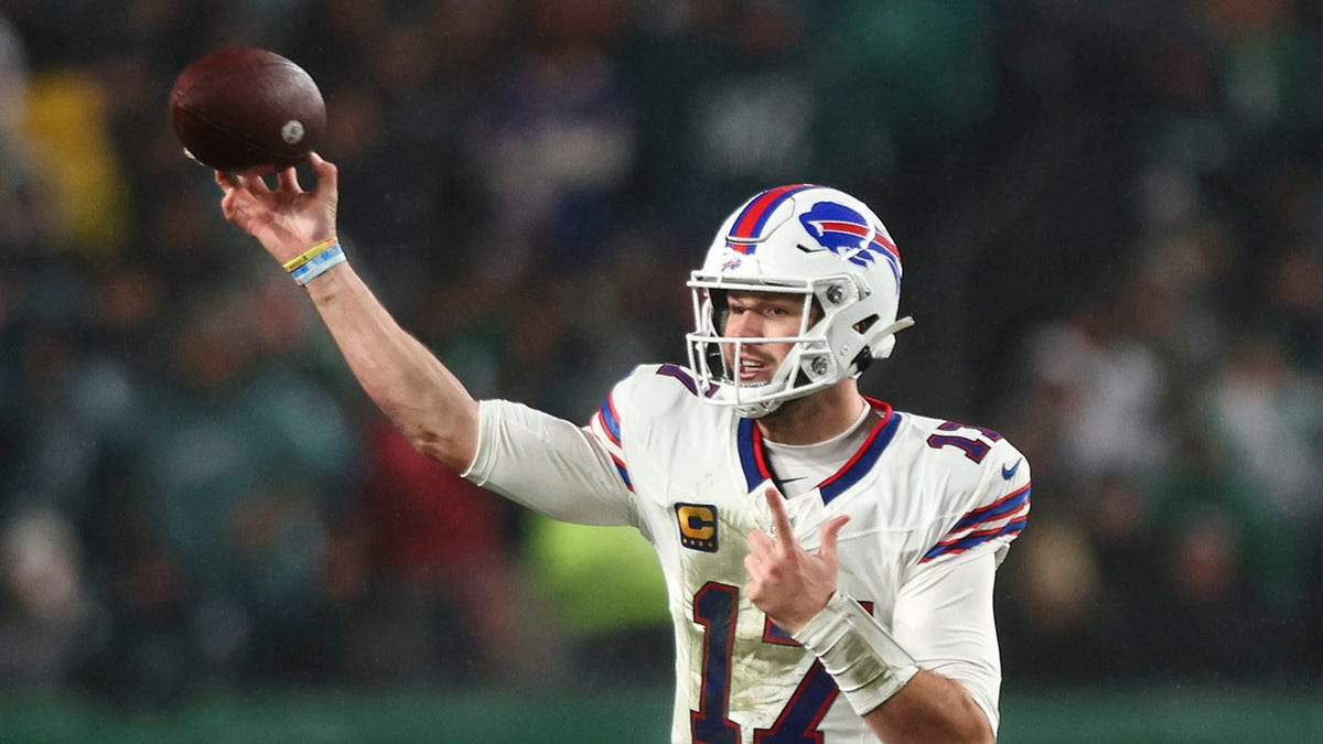 Josh Allen throws ball