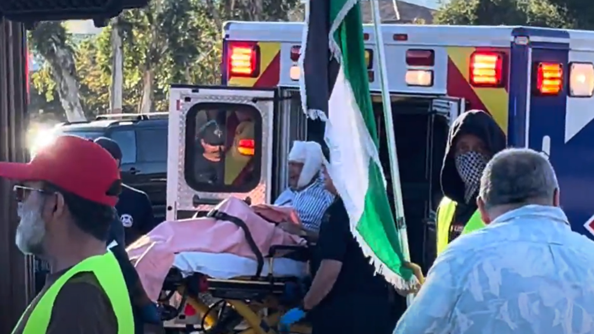 Paul Kessler being loaded into an ambulance