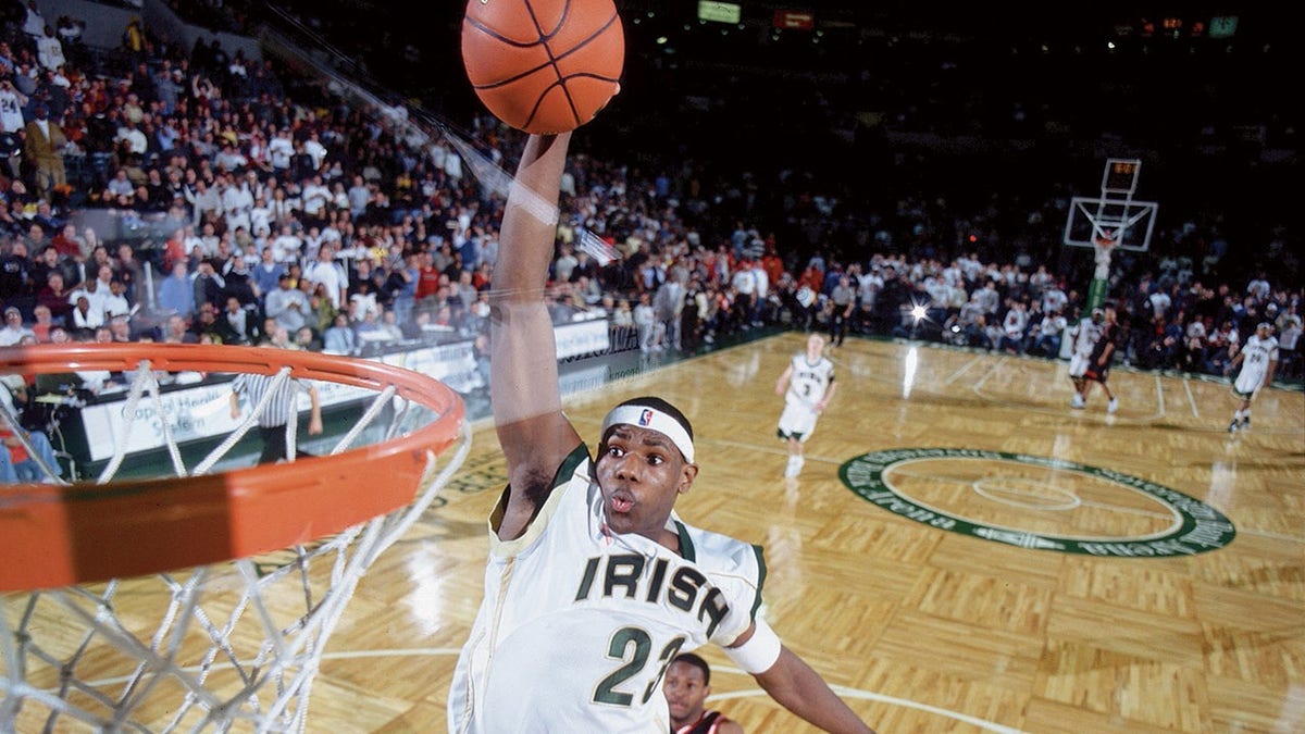 LeBron James dunks during St, Vincent-St, Mary game