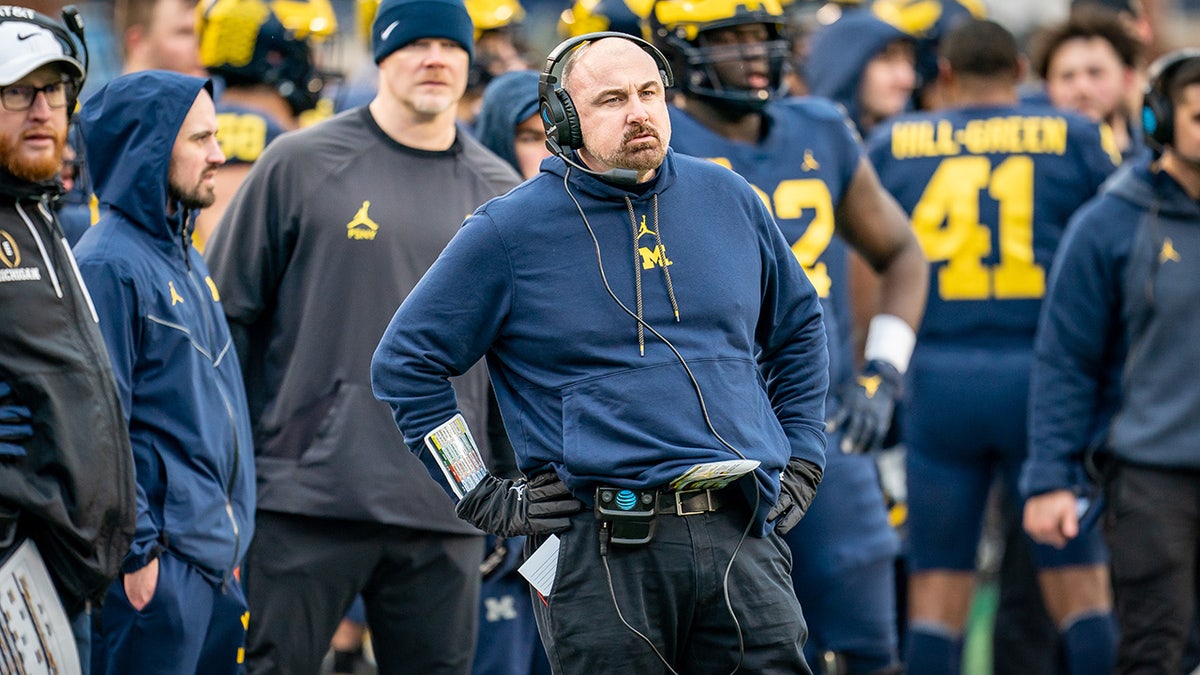 Coach Chris Partridge looks on during a Michigan game