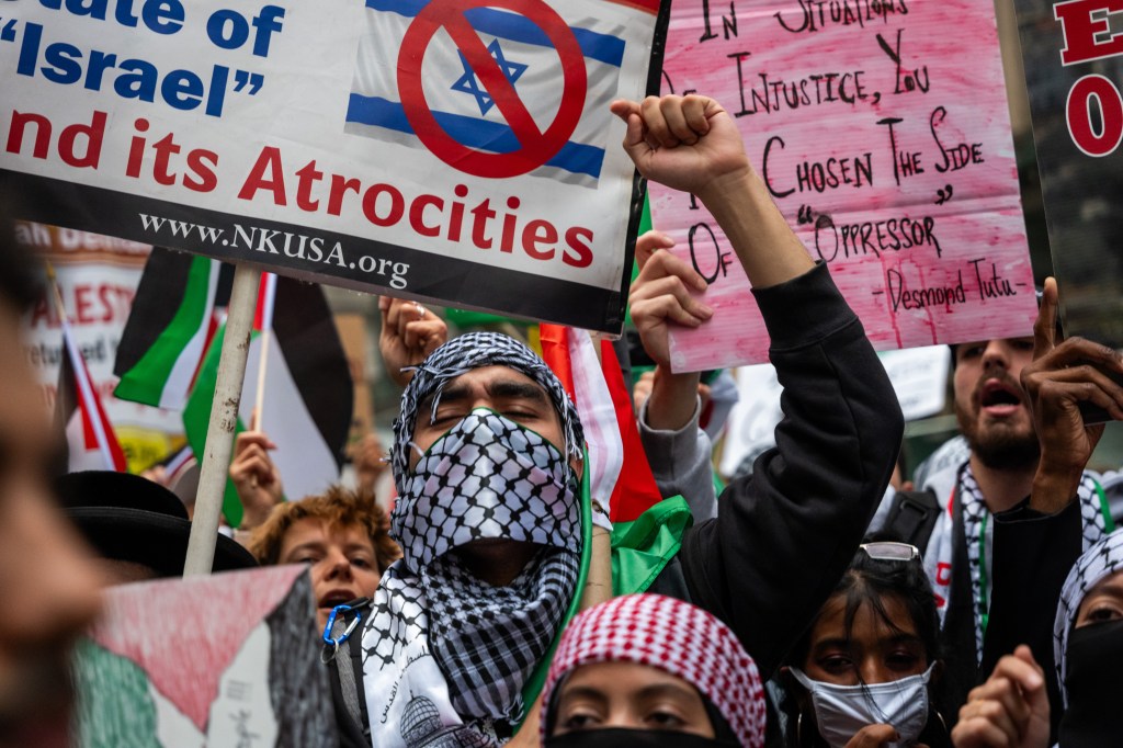 Supporters of Palestine hold a rally in New York's financial district as the fighting continues in Gaz