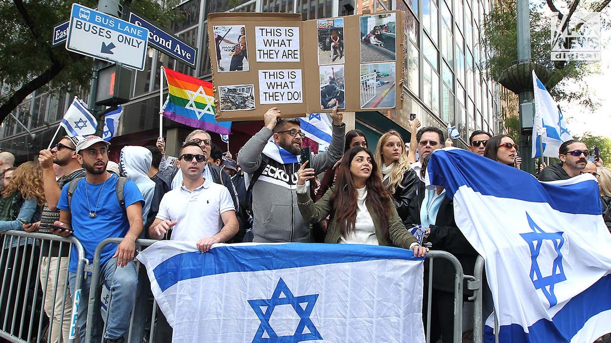 Demonstrators attend an 