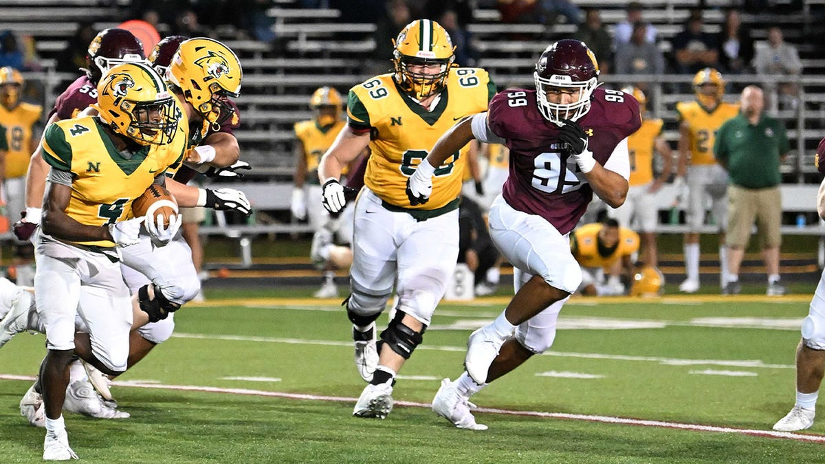 Reed Ryan runs with ball