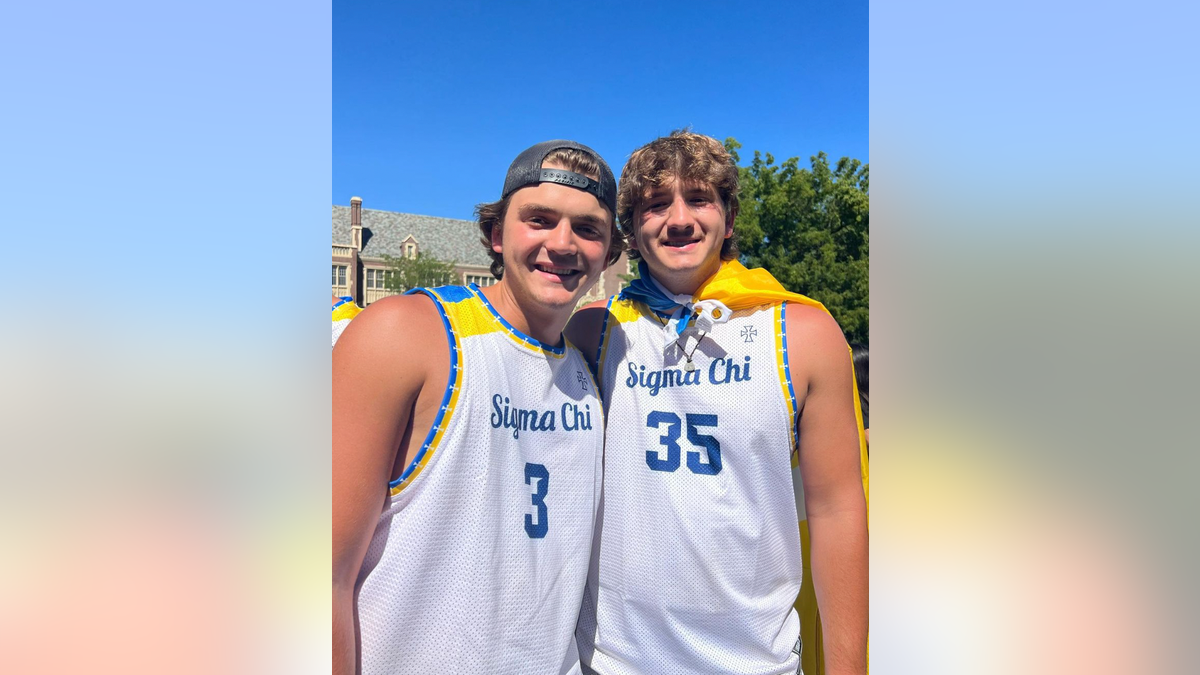 Ethan and Hunter Chapin wearing Sigma Chi shirts.