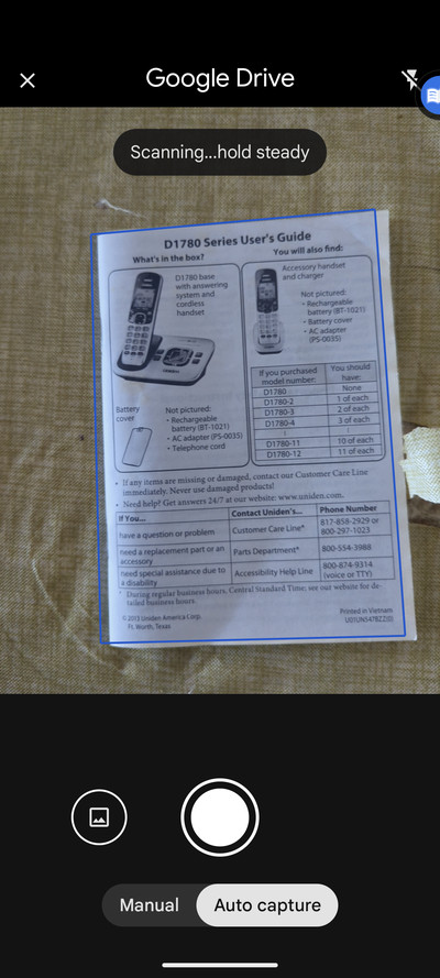 Google Drive screen with “scanning hold stead” at top, and a photo of a booklets with a blue outline around it.