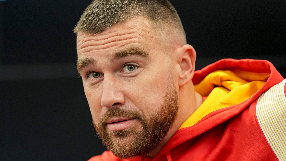 Travis Kelce talks to reporters