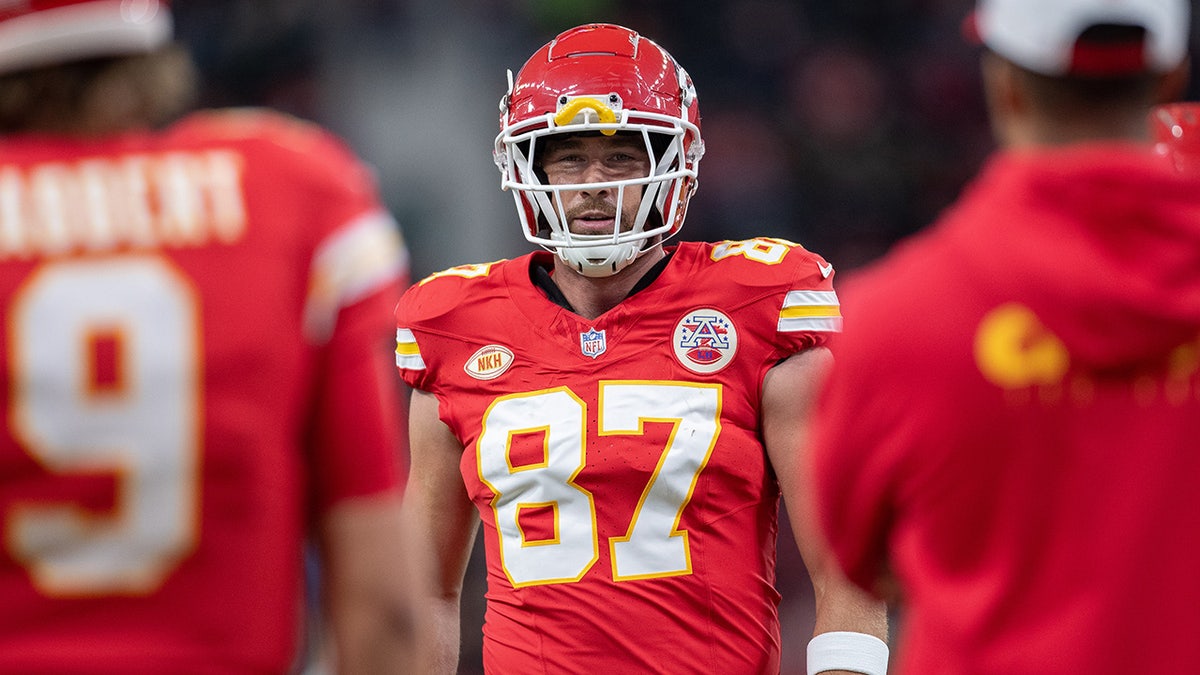 Travis Kelce stands in Germany