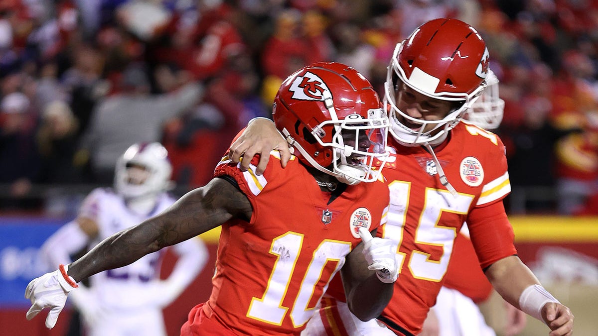 Tyreek Hill celebrates with Patrick Mahomes