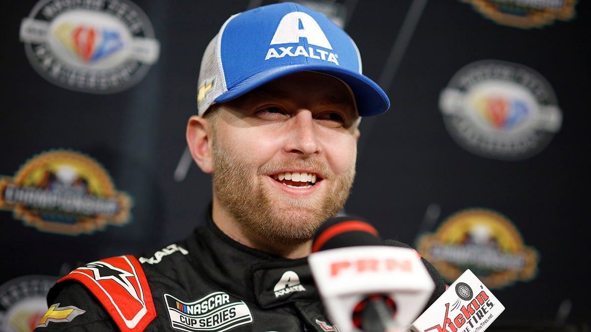 William Byron talks to reporters